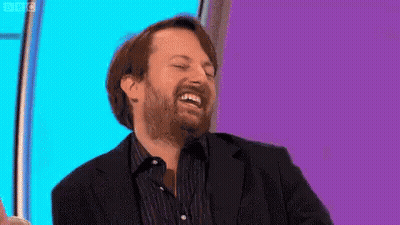 Man With Beard Laughing In Suit And Shirt GIF