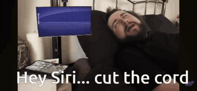 Man With Beard Laying In Bed Saying Hey Siri Cut The Cord GIF