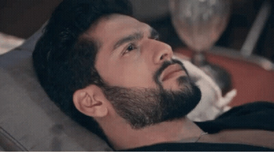 Man With Beard Laying On Bed GIF