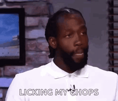Man With Beard Licking Lips GIF