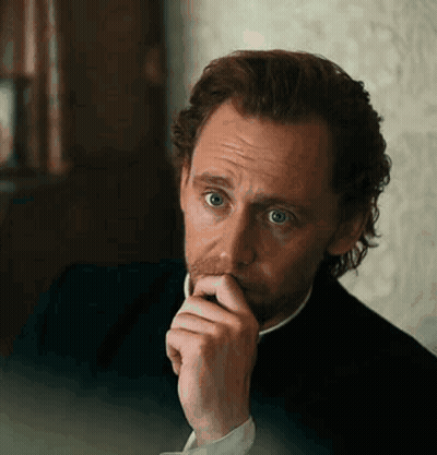 Man With Beard Looking At Camera GIF