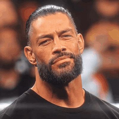 Man With Beard Looking At Camera GIF