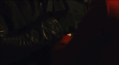 Man With Beard Looking At Woman In Red Shirt GIF