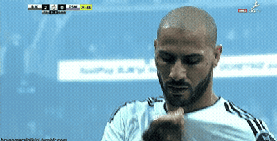 Man With Beard Looking Down At BJK Scoreboard GIF