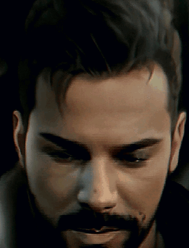 Man With Beard Looking Down GIF