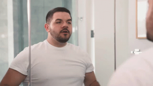 Man With Beard Looking In Mirror GIF