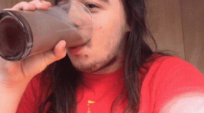 Man With Beard Lying On Chair With Ketchup On Face Saying What's That GIF