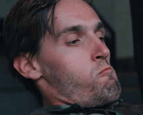 Man With Beard Making Face With Eyes Closed GIF