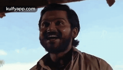 Man With Beard Making Funny Face And Waving GIF