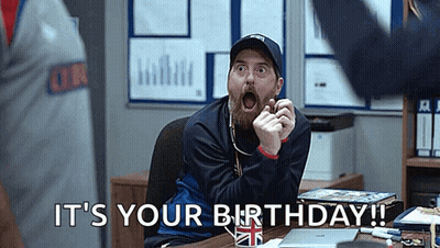 Man With Beard Making Funny Face At Desk GIF