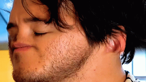 Man With Beard Making Funny Face With Eyes Closed GIF