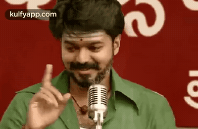 Man With Beard Pointing At Microphone GIF