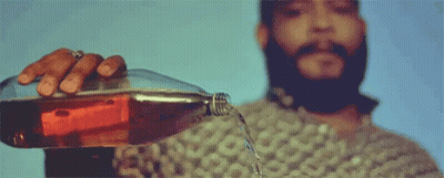 Man With Beard Pouring Soda Into Glass GIF