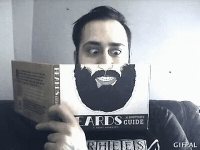 Man With Beard Reading Beard Guide GIF
