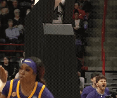 Man With Beard Riding Exercise Bike In Gym GIF