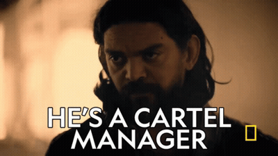 Man With Beard Saying He's A Cartel Manager GIF