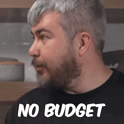 Man With Beard Saying No Budget GIF