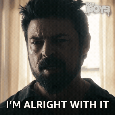 Man With Beard Says I'm Alright With It In Front Of Window GIF