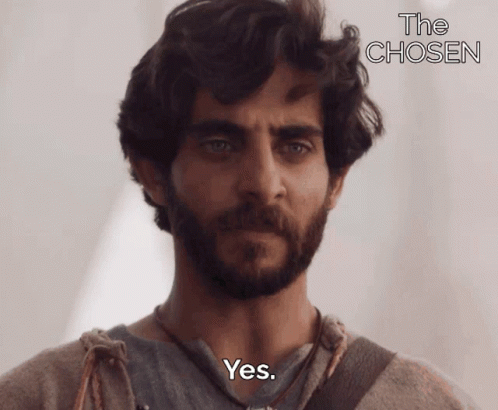Man With Beard Says Yes In Front Of The Chosen Sign GIF