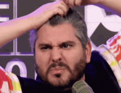 Man With Beard Scratching Head Making Funny Face GIF