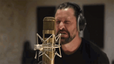 Man With Beard Singing Into Microphone GIF