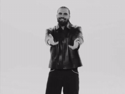 Man With Beard Singing Into Microphone GIF