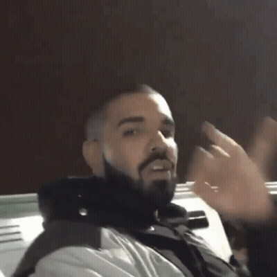 Man With Beard Singing Into Microphone GIF
