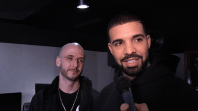 Man With Beard Singing Into Microphone GIF