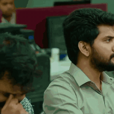 Man With Beard Sitting At Desk GIF