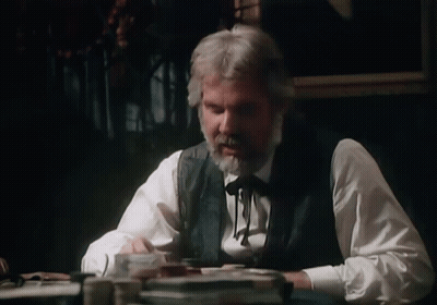 Man With Beard Sitting At Table GIF