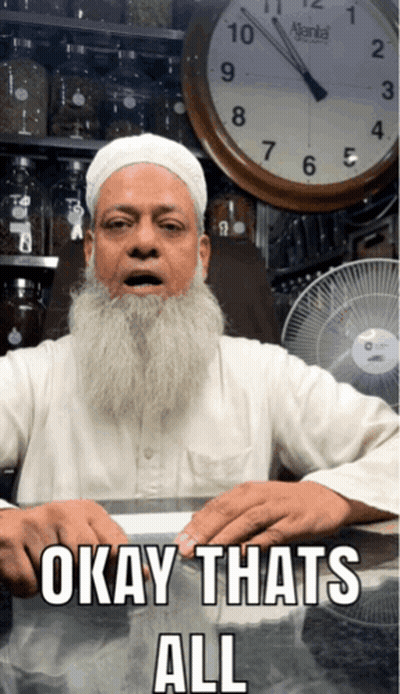 Man With Beard Sitting At Table GIF