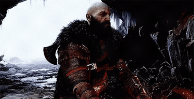 Man With Beard Sitting In Cave GIF