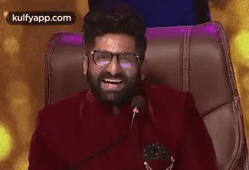 Man With Beard Sitting In Chair GIF