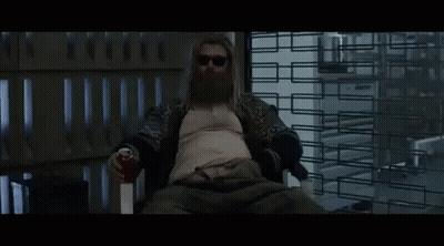 Man With Beard Sitting In Chair Holding Soda Can GIF