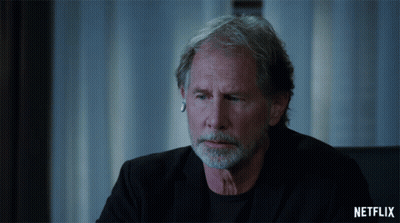 Man With Beard Sitting In Front Of Netflix Screen GIF