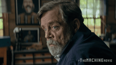 Man With Beard Sitting In Front Of Window #Themachinemovie GIF