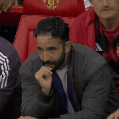 Man With Beard Sitting In Stadium Seat GIF