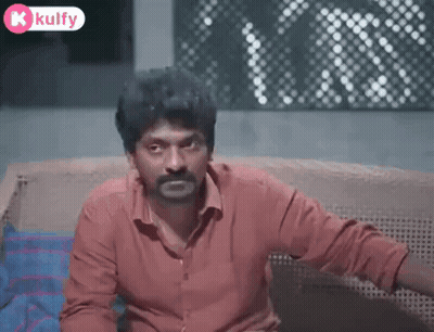 Man With Beard Sitting On Couch GIF