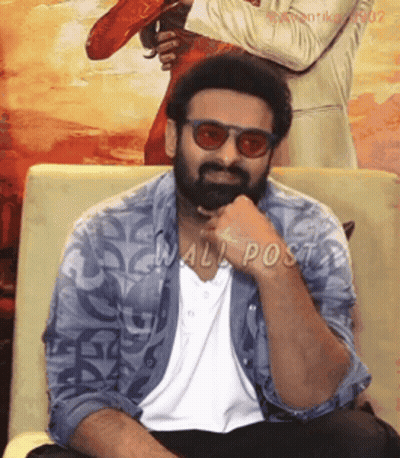 Man With Beard Sitting On Couch GIF