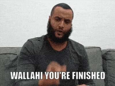 Man With Beard Sitting On Couch Says Wallahi You're Finished GIF