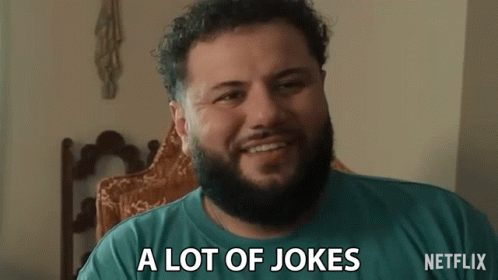 Man With Beard Smiling And Saying A Lot Of Jokes GIF