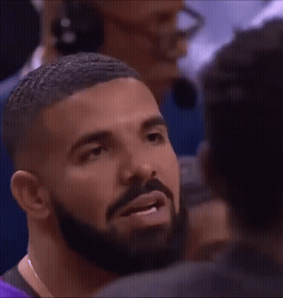 Man With Beard Smiling At Another Man GIF