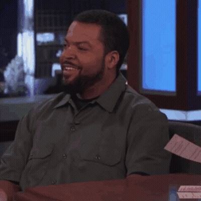 Man With Beard Smiling At Desk GIF