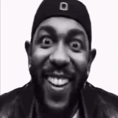Man With Beard Smiling In Black And White GIF