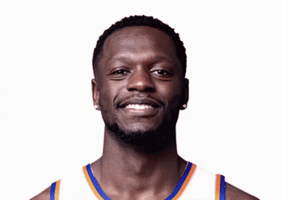 Man With Beard Smiling In Blue And Orange Jersey GIF