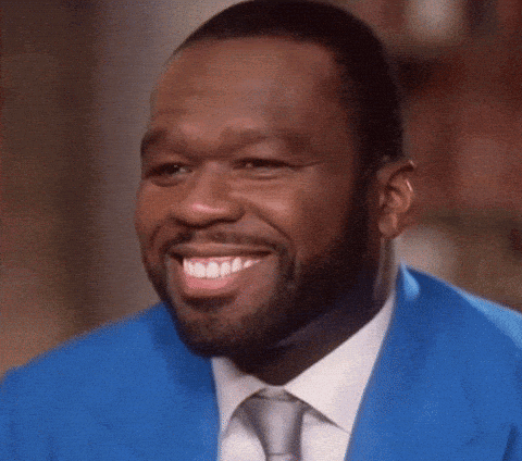 Man With Beard Smiling In Blue Suit And White Shirt GIF