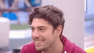 Man With Beard Smiling In Red Hoodie GIF