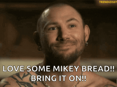 Man With Beard Smiling Saying Love Some Mikey Bread GIF