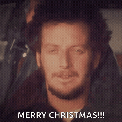Man With Beard Smiling Says Merry Christmas GIF