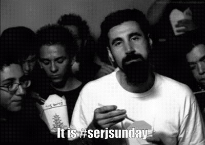 Man With Beard Smoking Cigarette In Crowd #Serjsunday GIF